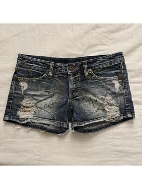 D.i.a. Distressed denim mini shorts frayed hem, rips, metal rings paint splatter